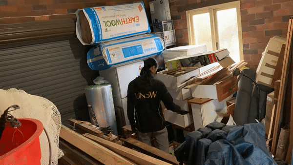 Working in the garage cutting window rafters
