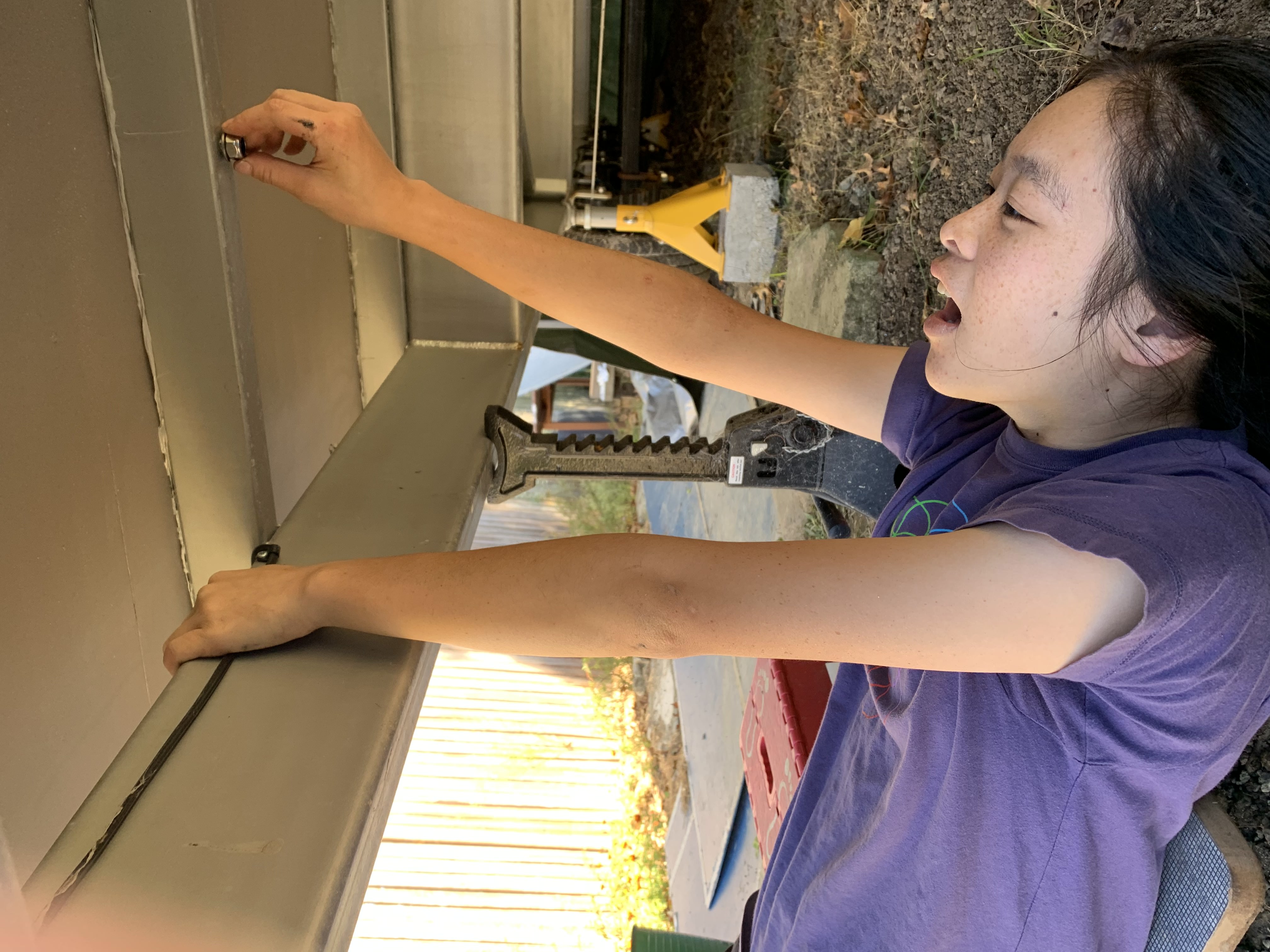 Lys under the trailer bolting screws