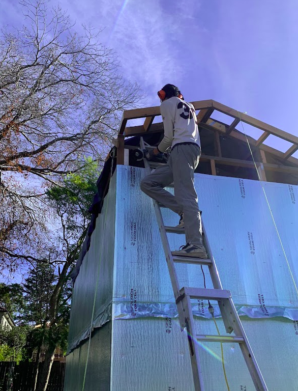 Erny working on the eave