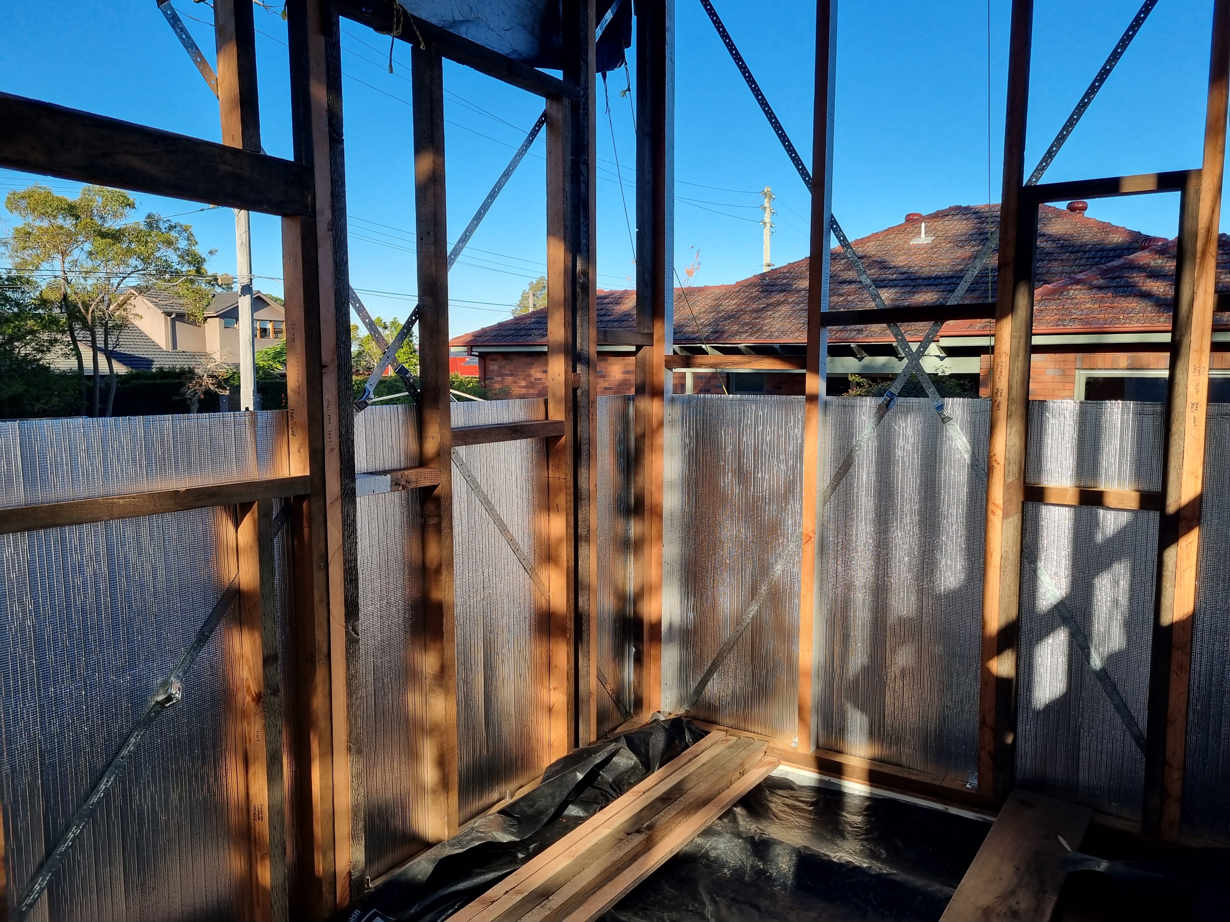 The first section of the tiny house wrapped