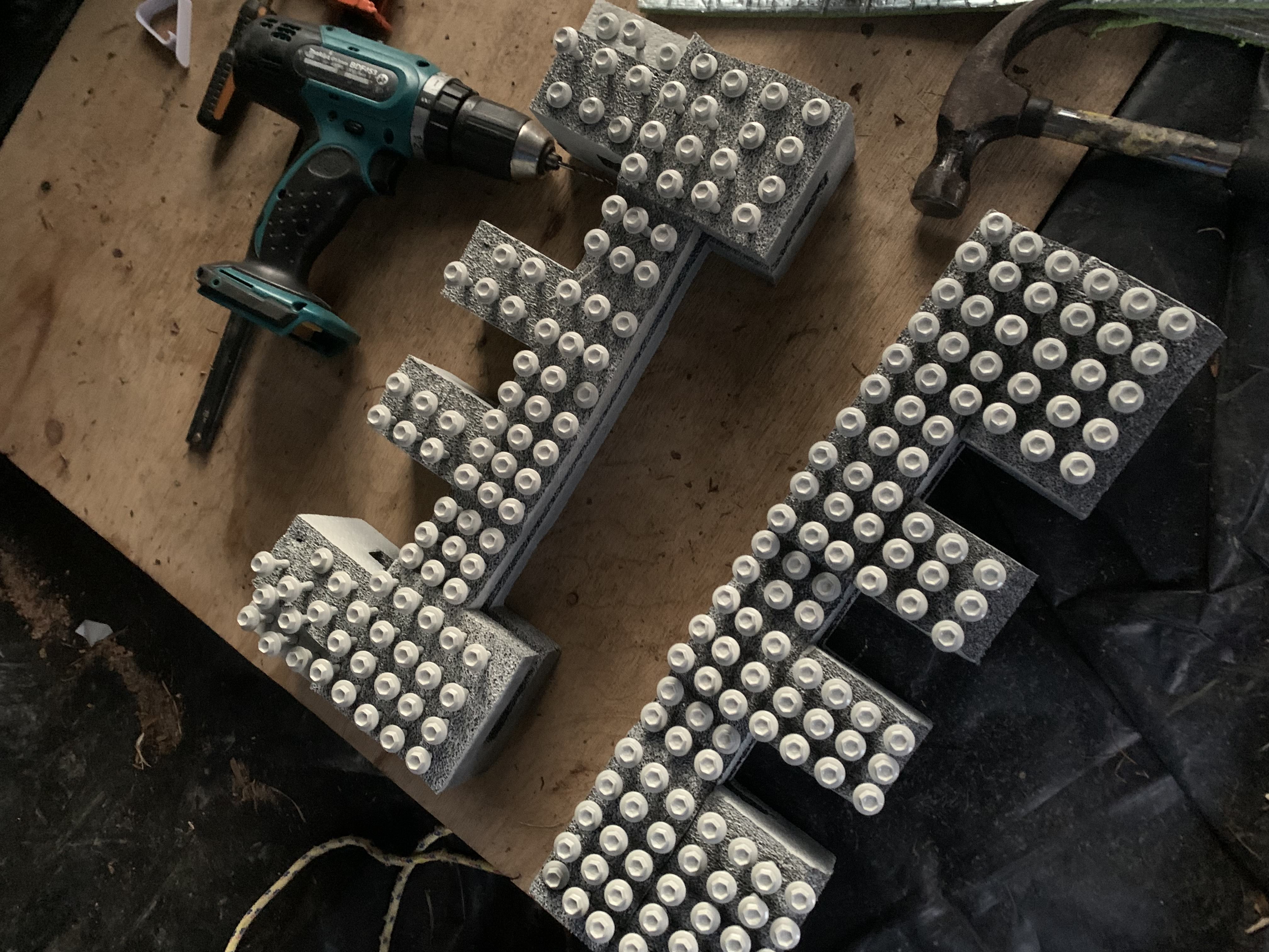 Spray painting the tops of the screws