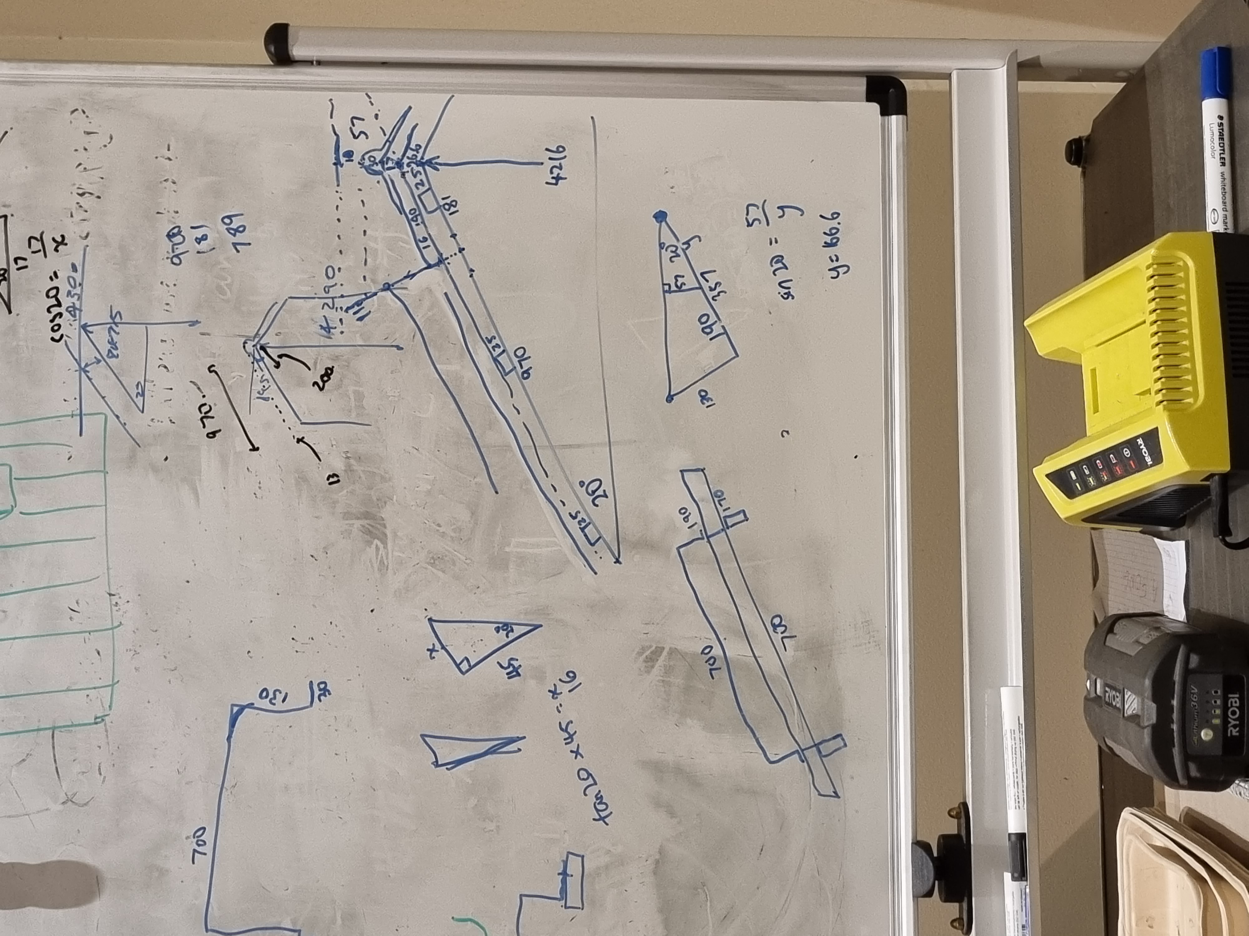 Late night whiteboard maths to make sure everything fits under the height limit