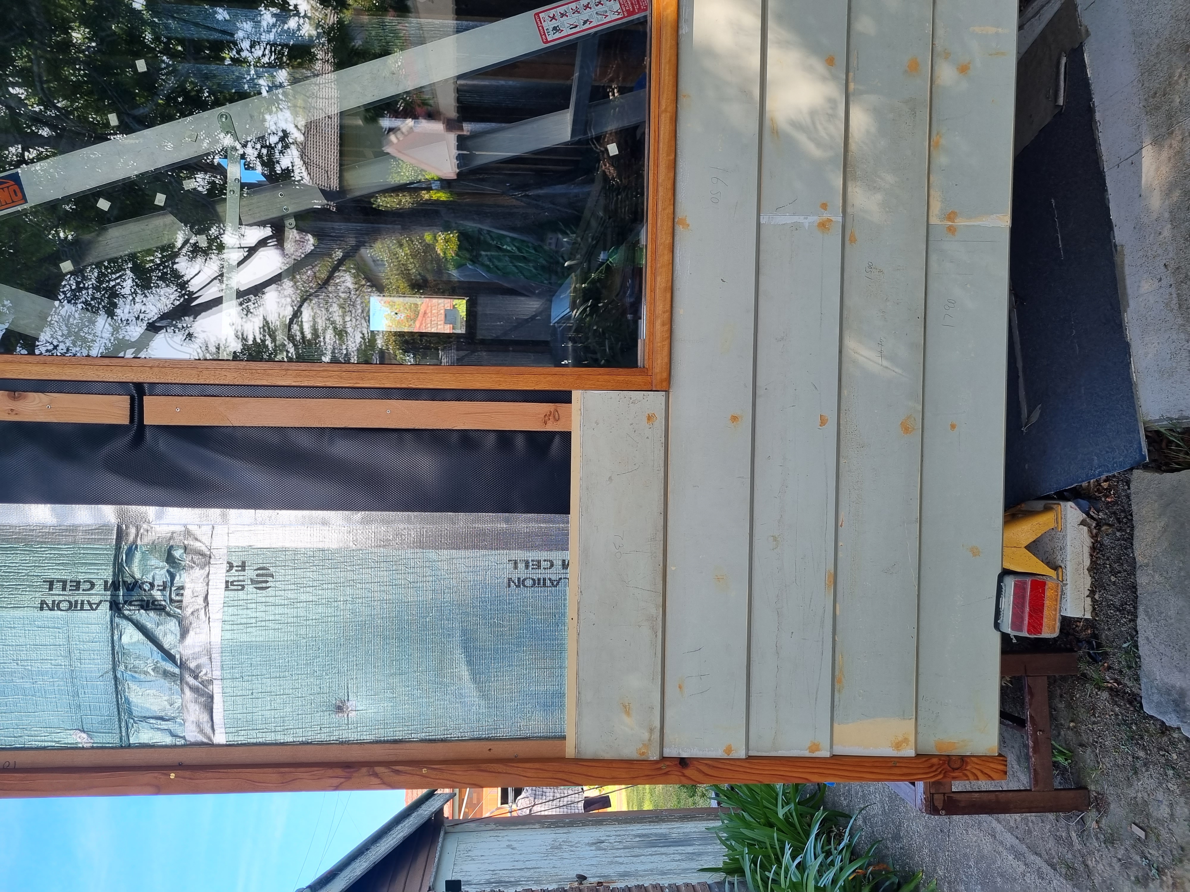 Starting to clad the wall