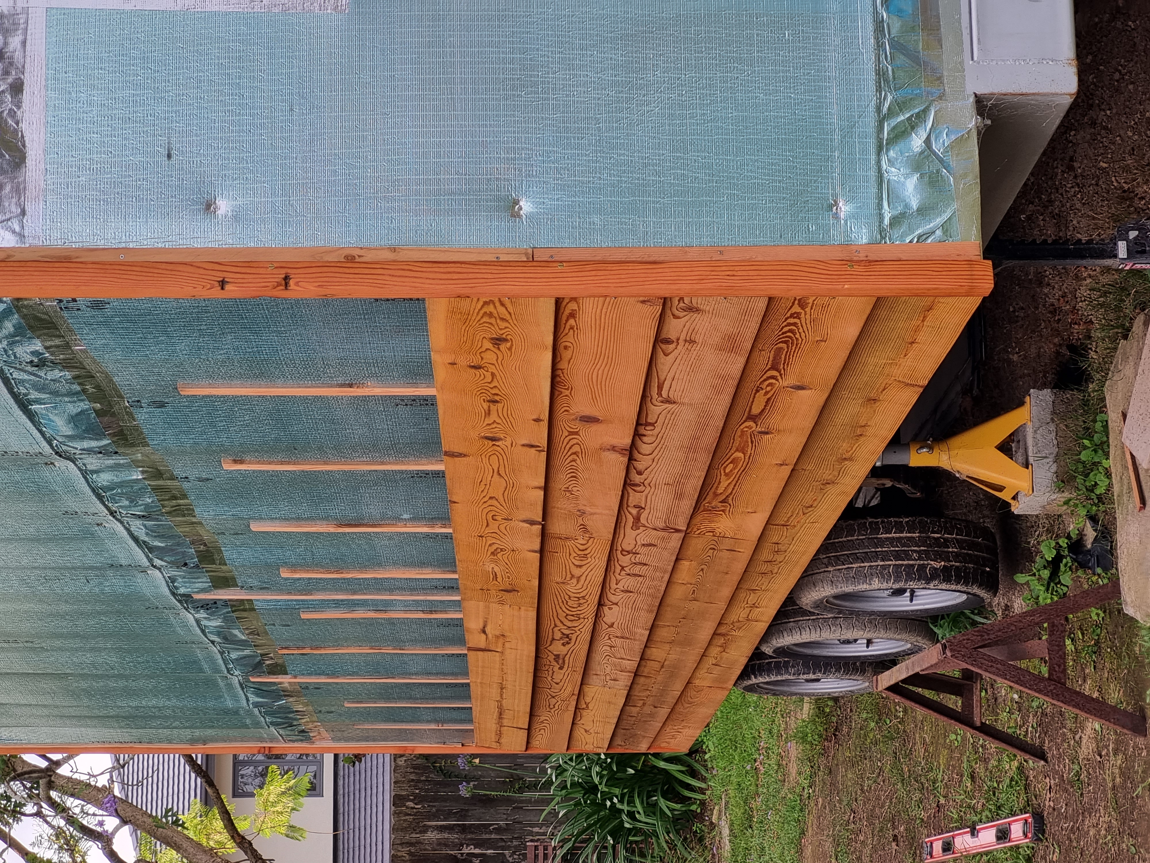 Starting the long wall with the western red cedar