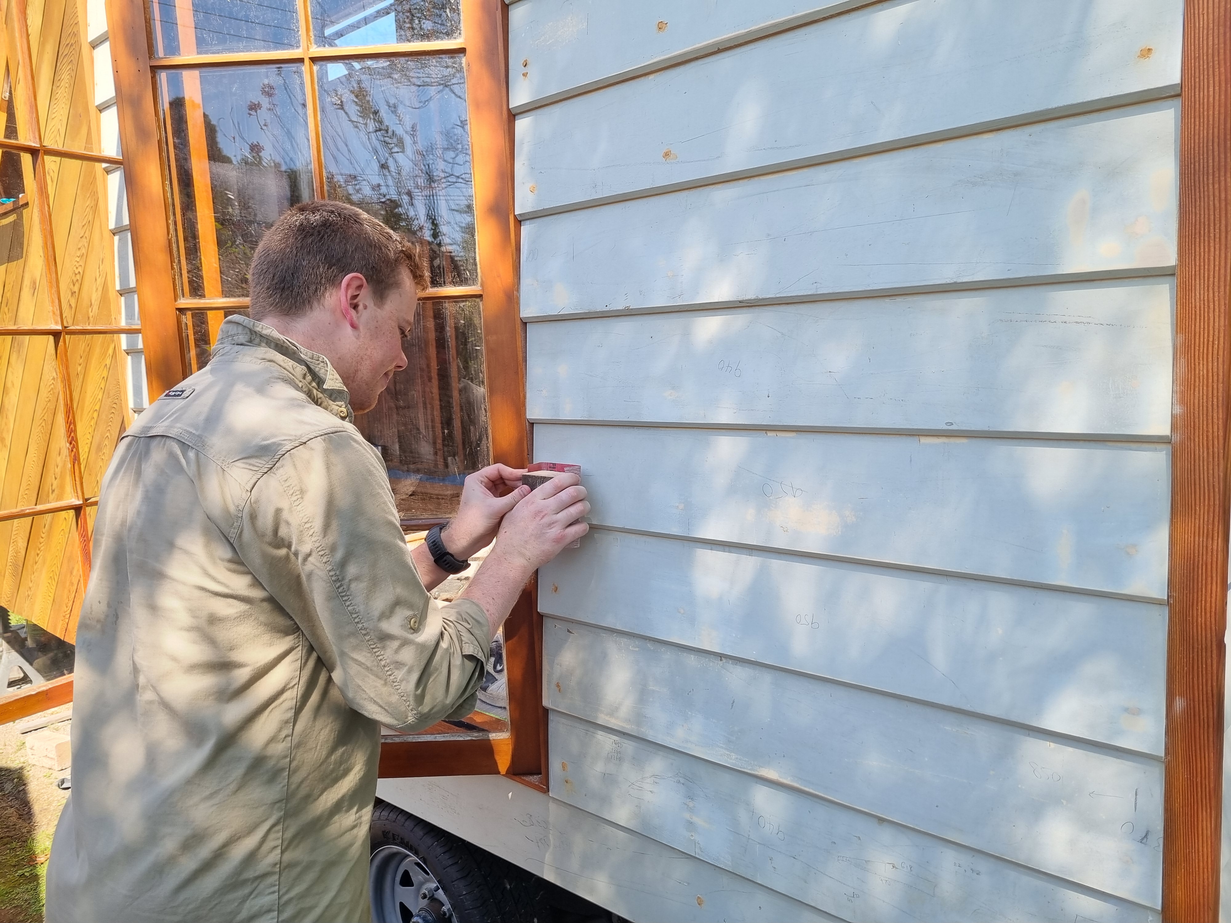 Troy sanding away