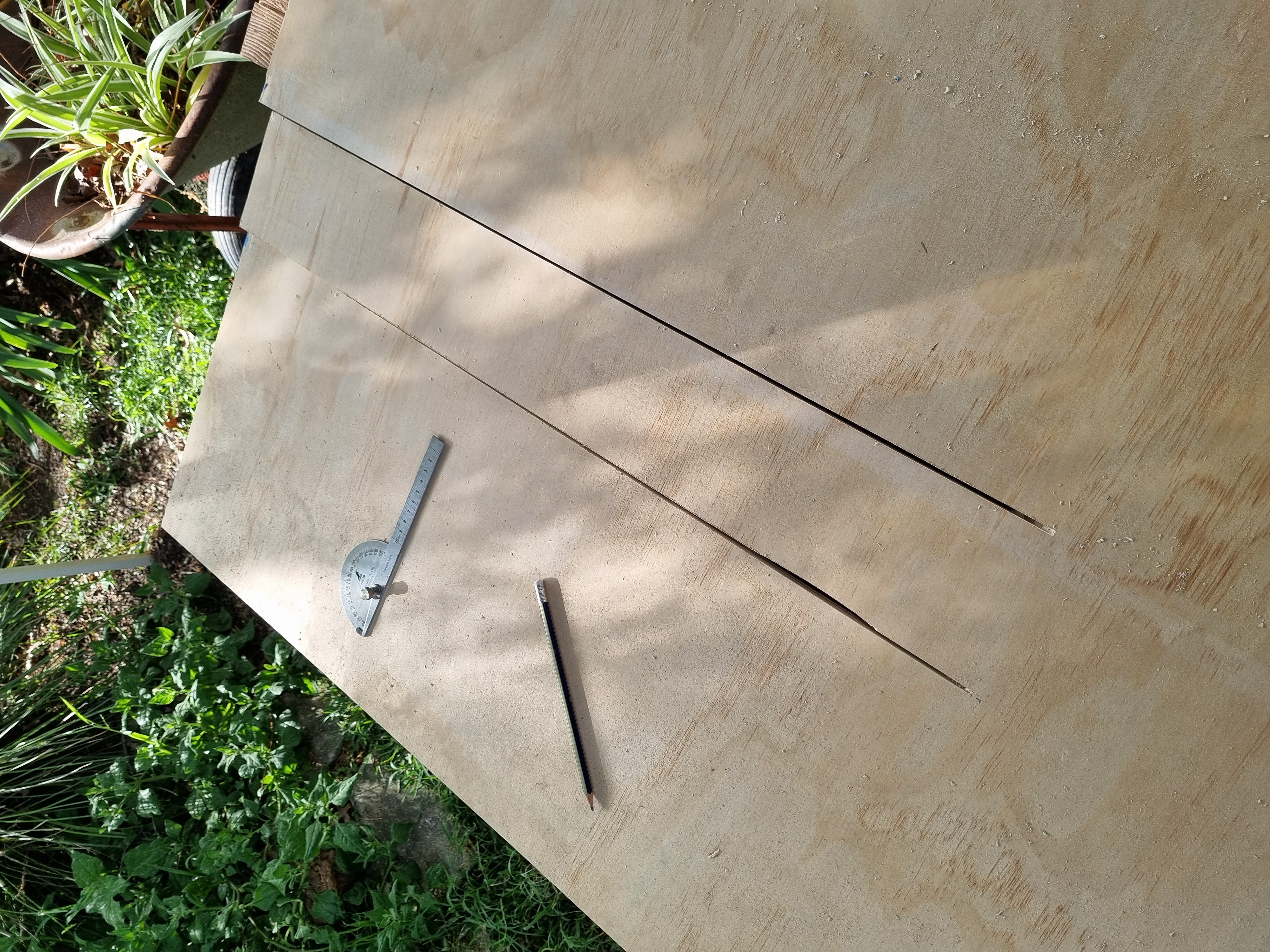 Cutting custom wall pieces out of the plywood wall