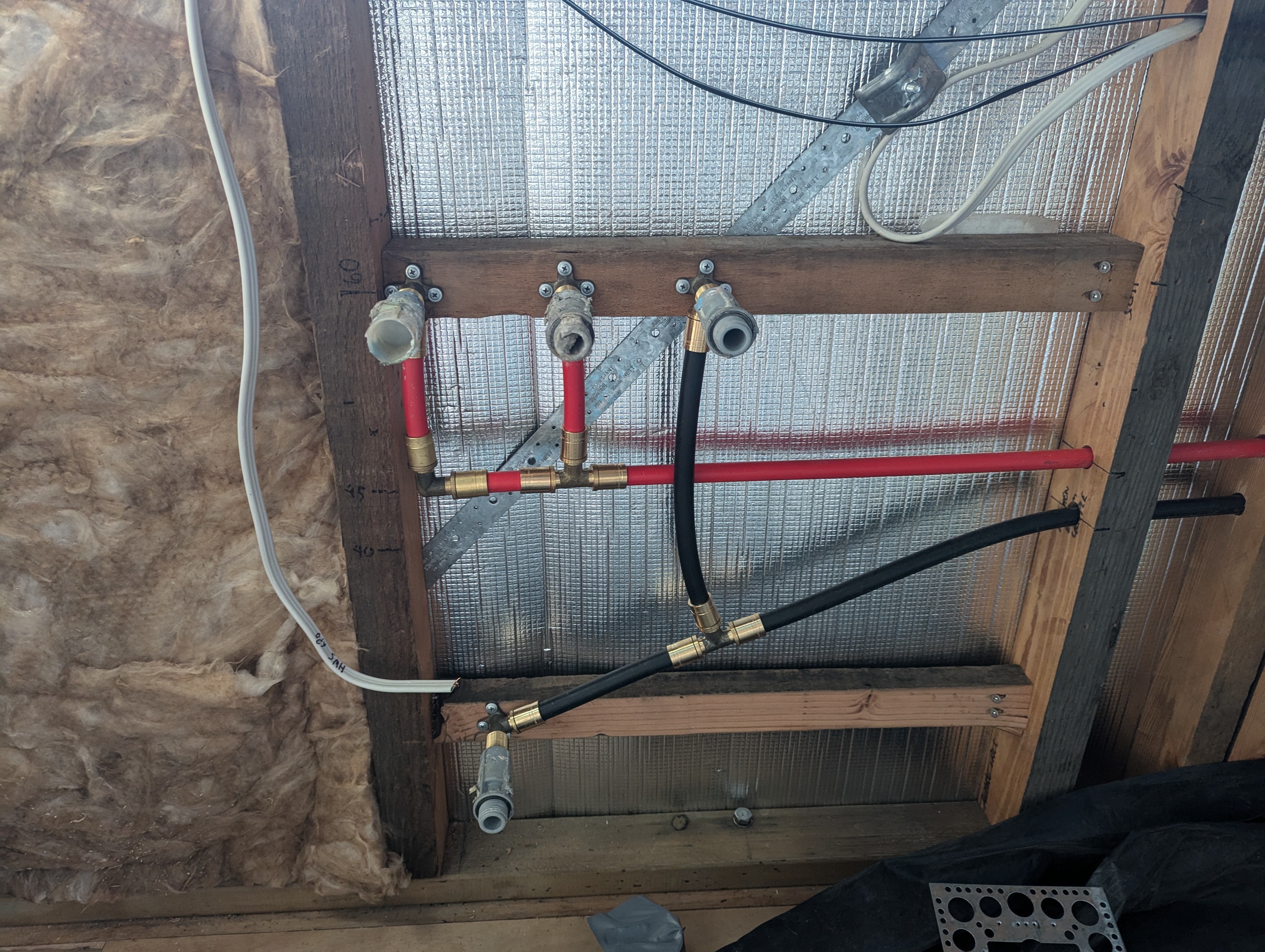 Red and black pex pipes for the washing machine