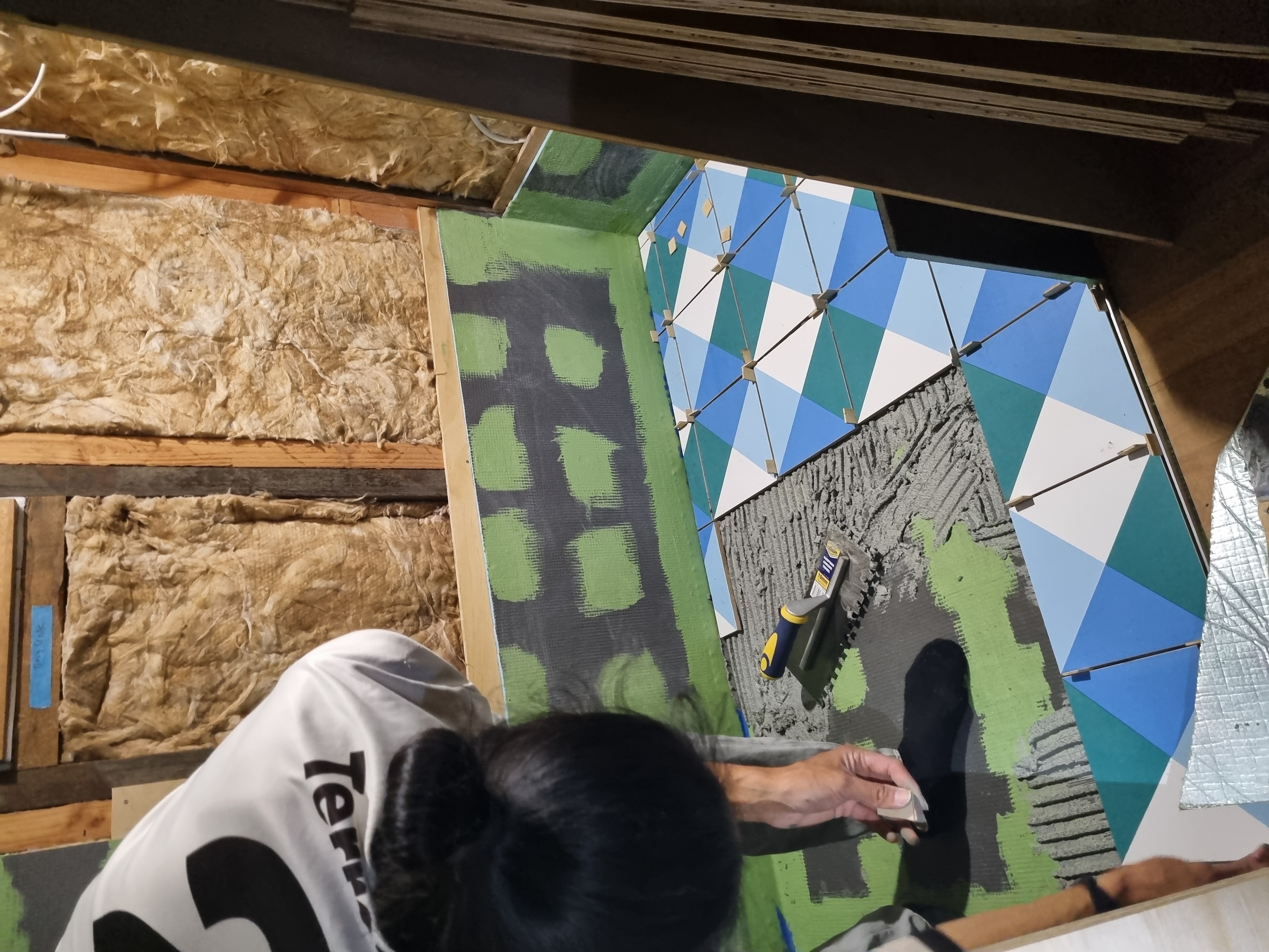 Tiling late into the evening