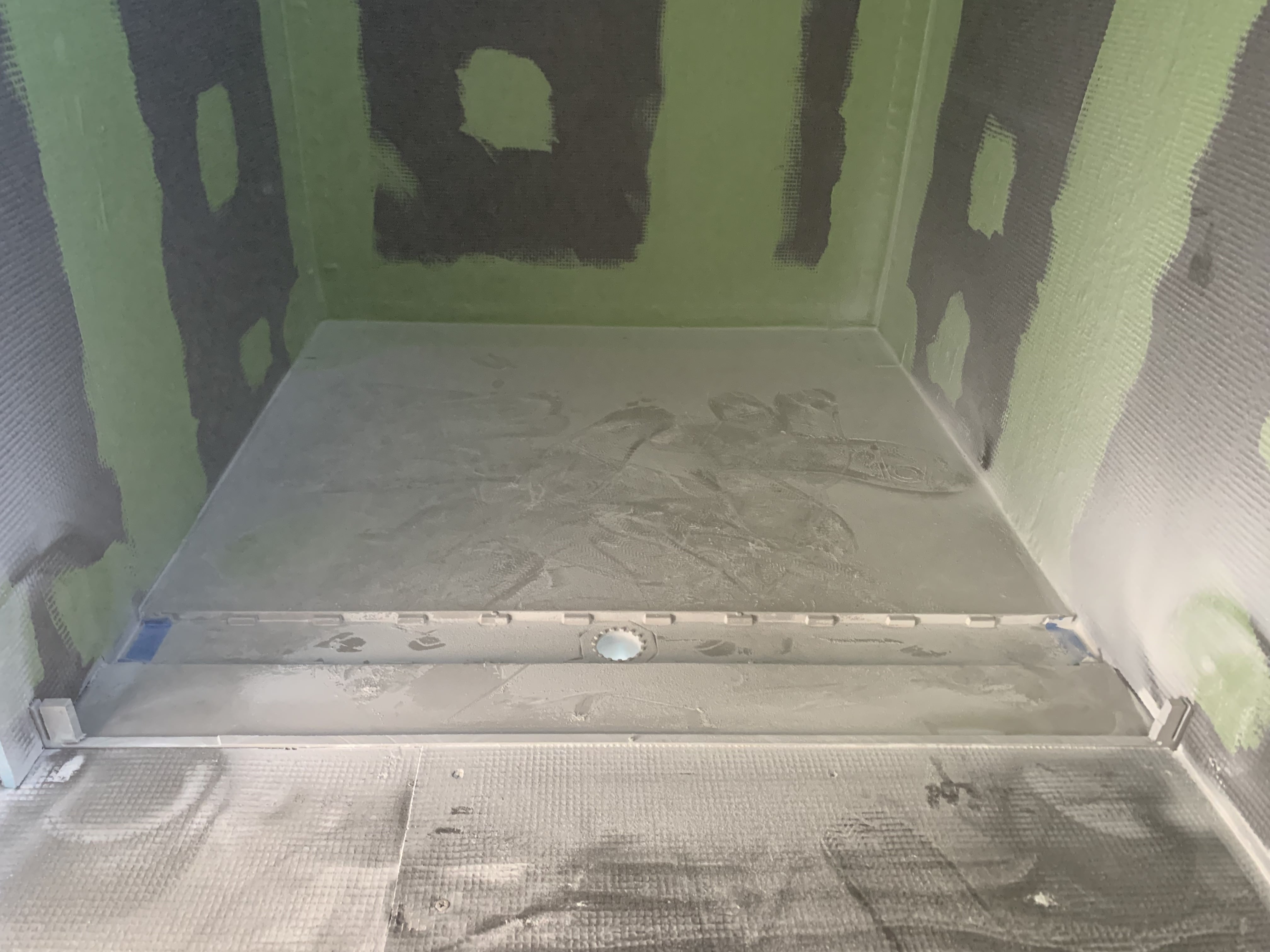 Cutting the shower base for a flush tile over