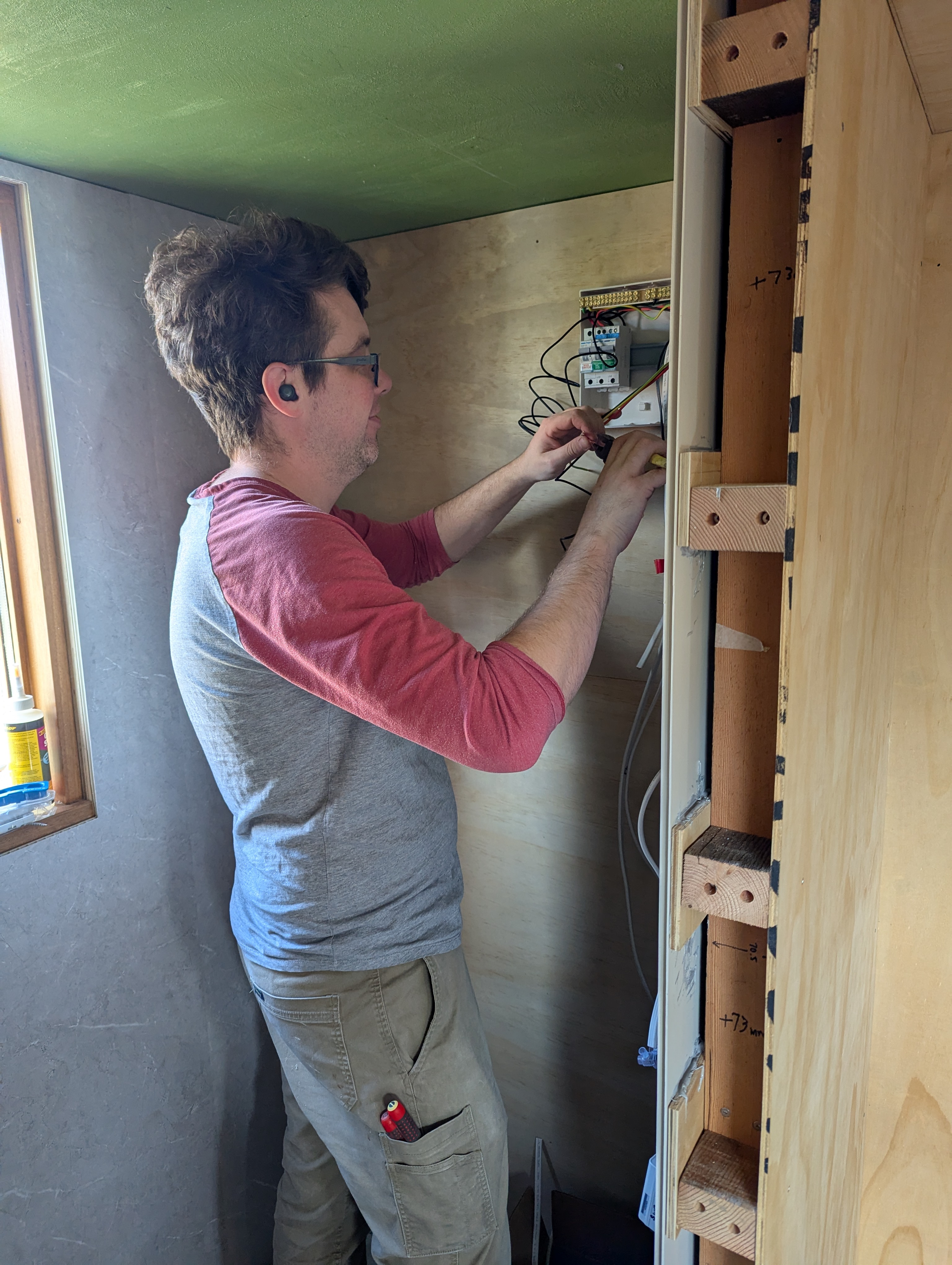 James working on the switch box